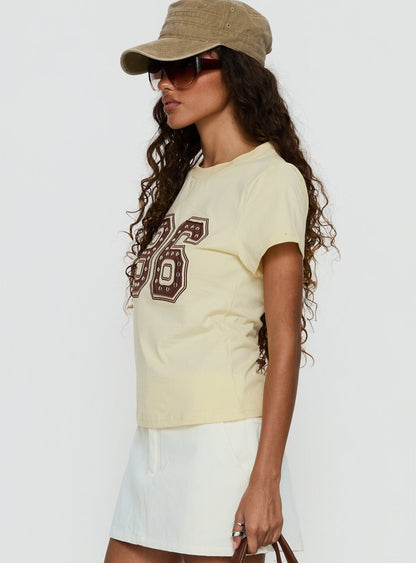 96 Charm Studded Graphic Baby Tee Yellow