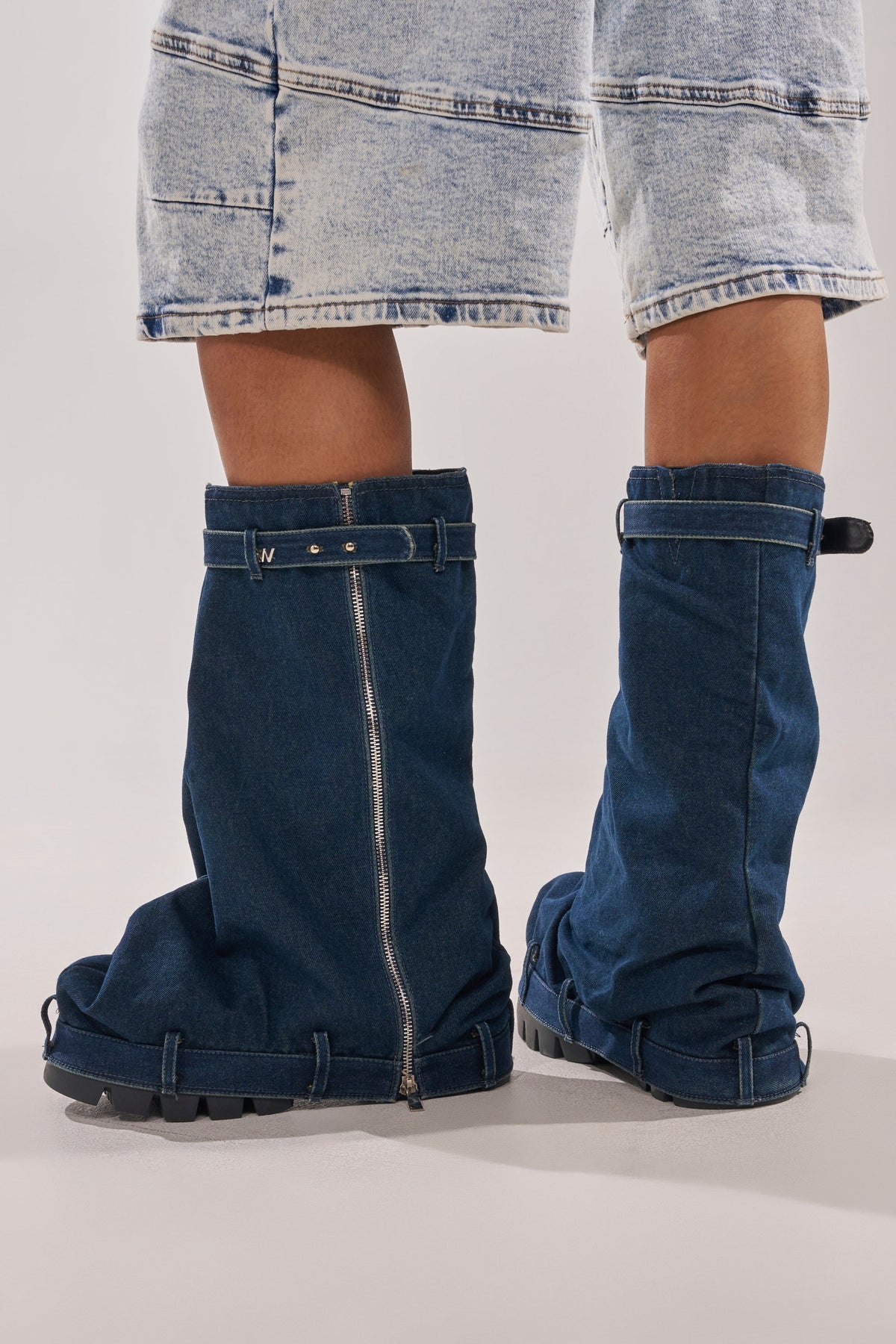 AKIRA GOLD ANGELA FOLD OVER PLATFORM BOOT IN DARK DENIM