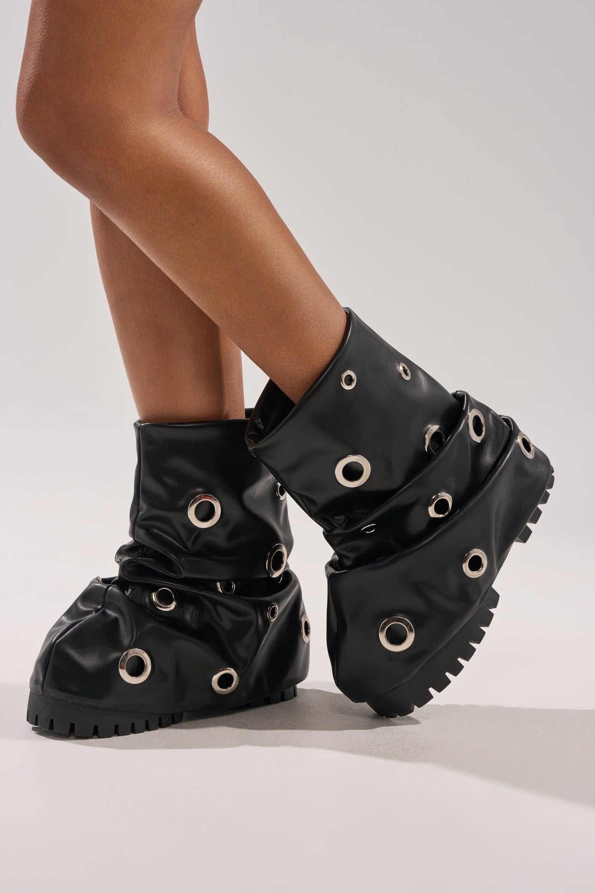 AKIRA GOLD FABLE BLACK GROMMET EMBELLISHED FLAT BOOTIE