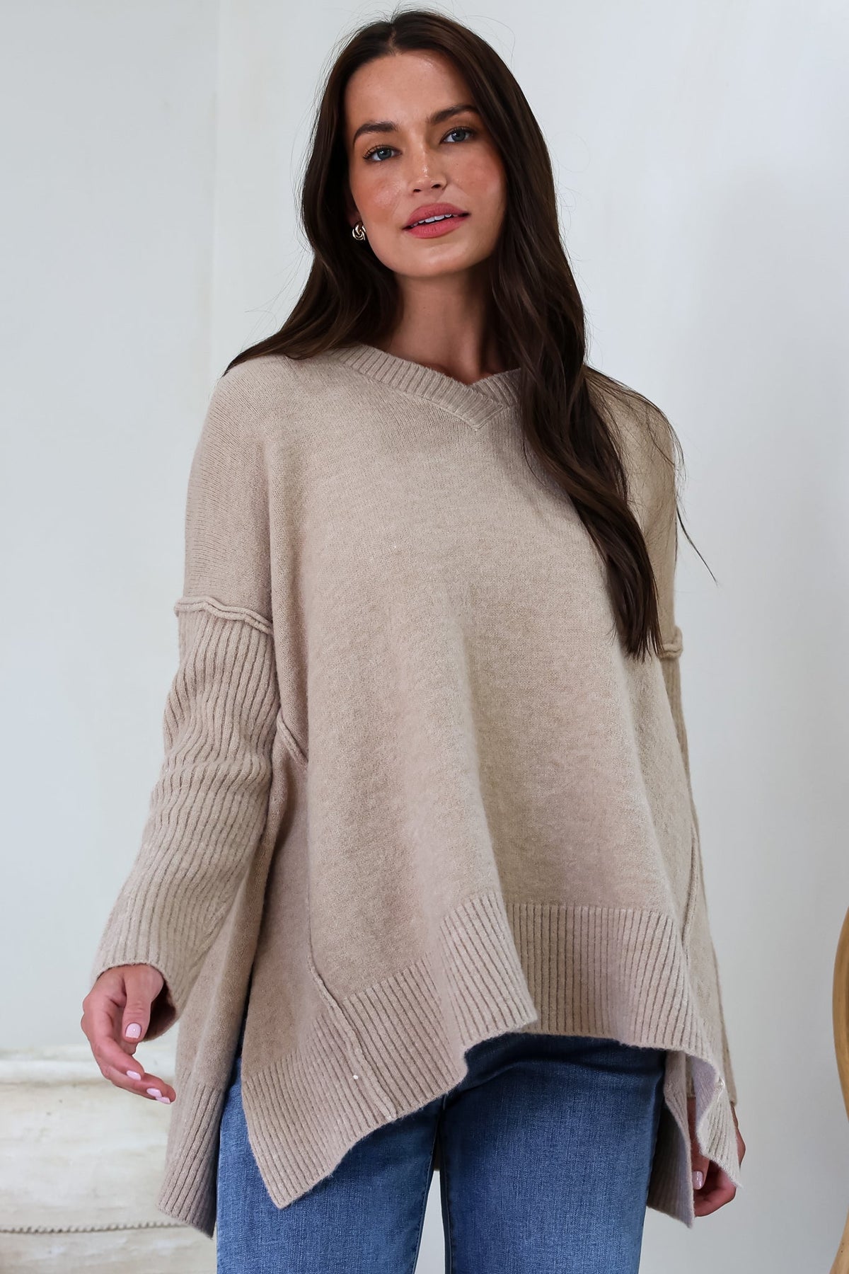 Ridge Jumper - V Neck Relaxed Shark Bite Ribbed Hemline Knit in Beige