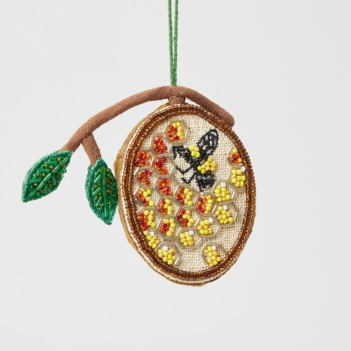 Beehive ornament with beaded leaves and honeycomb, perfect for Rosh Hashanah gifts