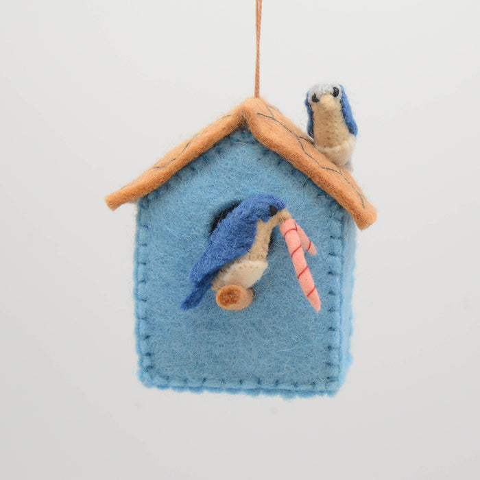 Hand-felted birdhouse ornament with stitched details and soft merino-blend wool