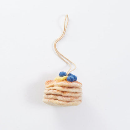 Craftspring’s Blueberry Pancake Stack Ornament from the Iconic Craftspring Ornaments Bundle — felt stack of pancakes with needle felted details, a playful ornament perfect for holiday gifting — heirloom-quality Christmas decor, ethically crafted by artisans using sustainable wool.