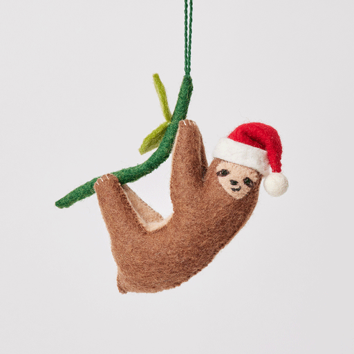Craftspring’s Lazy Santa Sloth Ornament from the Iconic Craftspring Ornaments Bundle rotating to show front, side, and back views — felt sloth wearing a Santa hat with sweet holiday details, a playful ornament perfect for holiday gifting — heirloom-quality Christmas decor, ethically crafted by artisans using sustainable wool.