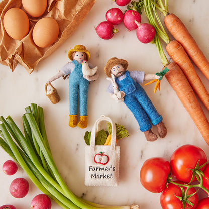 Artisan wool ornament of woman farmer with fresh eggs and chicken – perfect gift for farm-to-table enthusiasts and gardeners.