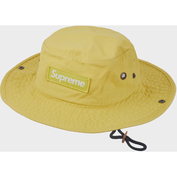 Supreme Military Boonie - Dusty Gold (FW23) with adjustable chin strap and breathable fabric for outdoor activities
