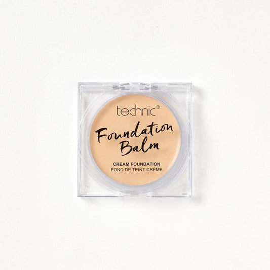 A foundation balm in the shade Oat Milk on a white background.