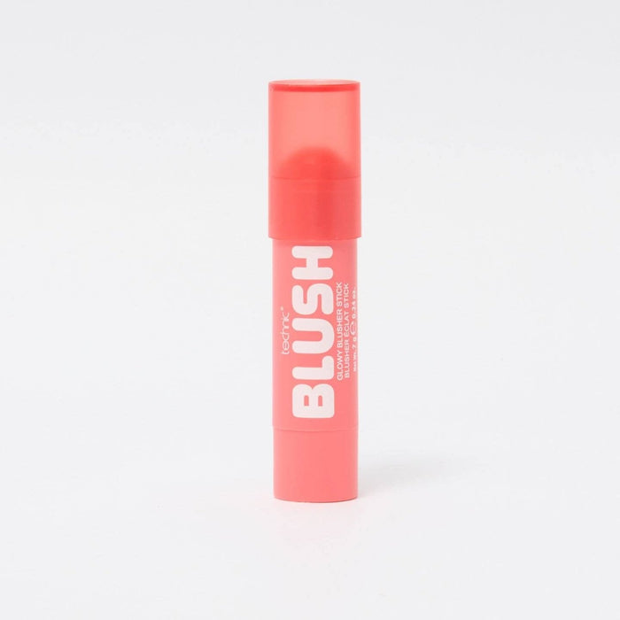 A blusher stick in the shade Tropic Heart on a white background.