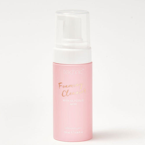 A foaming cleanser bottle in front of a white background.