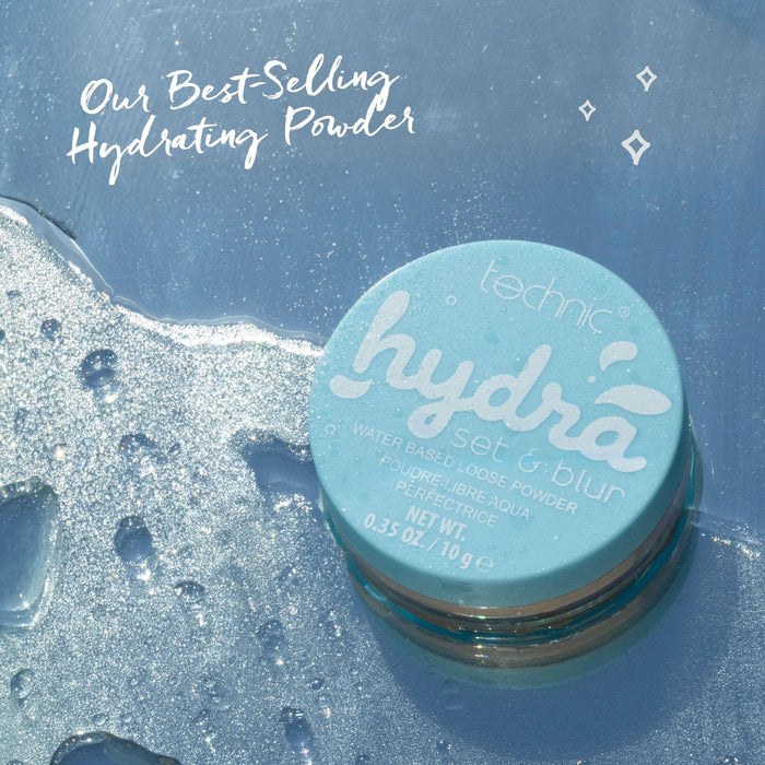 Light blue Technic hydrating powder compact on wet shimmering surface