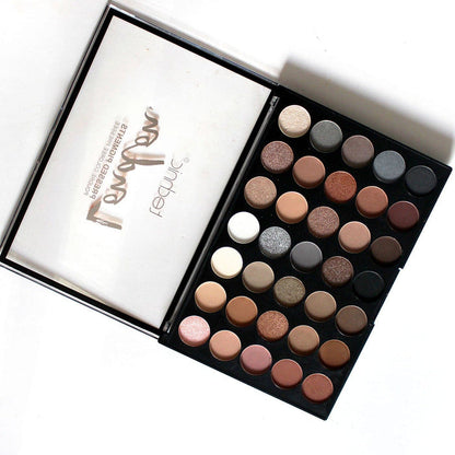 Close-up of Technic London Pressed Pigment Palette with matte, shimmer, and glitter finishes